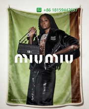 Miumiu Throw Blankets